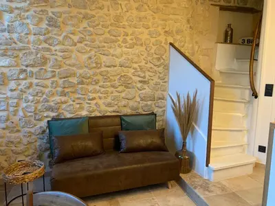 Coin salon dans l'établissement Charmante petite maison