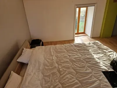Un ou plusieurs lits dans un hébergement de l'établissement Maison PRECEY