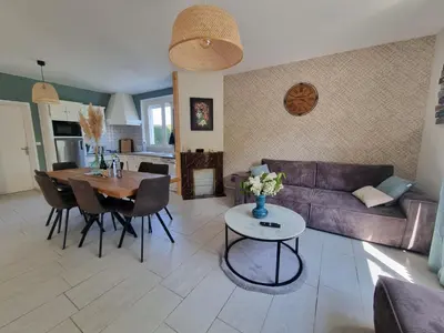 Coin salon dans l'établissement Maison proche Omaha Beach
