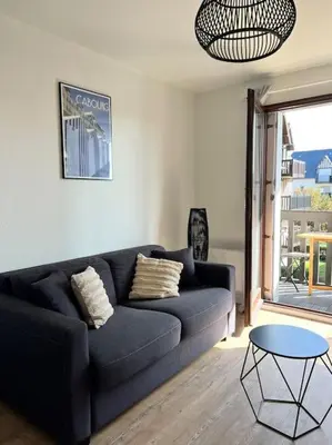 Coin salon dans l'établissement Appartement Cosy, 400m plage proche centre ville