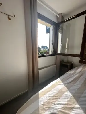 Un ou plusieurs lits dans un hébergement de l'établissement Appartement Cosy, 400m plage proche centre ville