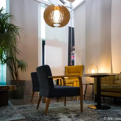Coin salon dans l'établissement Hotel Libera Caen Colombelles