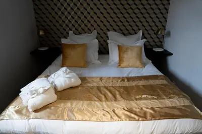 Un ou plusieurs lits dans un hébergement de l'établissement la Bastide du Laizon & Spa
