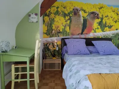 Un ou plusieurs lits dans un hébergement de l'établissement chambres d'hôtes du clos du roi