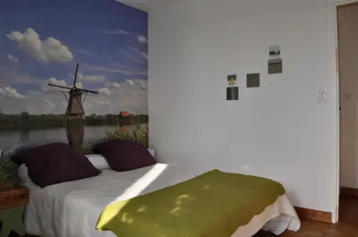 Un ou plusieurs lits dans un hébergement de l'établissement chambres d'hôtes du clos du roi