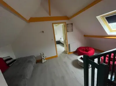 Coin salon dans l'établissement Gîte la Villemain