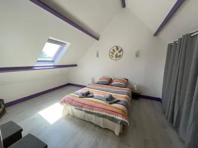 Un ou plusieurs lits dans un hébergement de l'établissement Gîte la Villemain