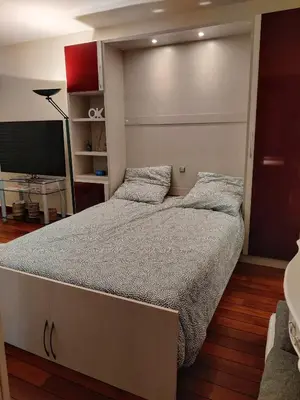Un ou plusieurs lits dans un hébergement de l'établissement Bel appartement refait à neuf, calme et ensoleillé
