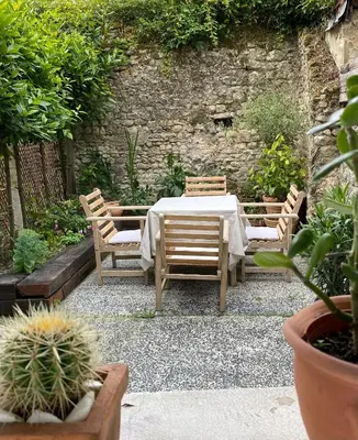 Jardin de l'établissement La maison des Teinturiers maison de ville avec jardin