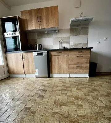 Cuisine ou kitchenette dans l'établissement MAISON DE VILLE