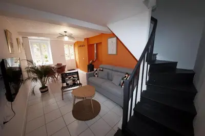 Coin salon dans l'établissement Gîte La Foresienne