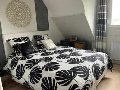 Un ou plusieurs lits dans un hébergement de l'établissement Maison à 700m de la plage