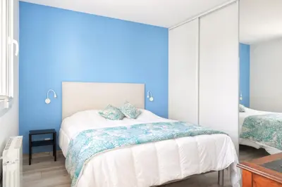 Un ou plusieurs lits dans un hébergement de l'établissement Chez Marie et Philippe - 1km de la plage