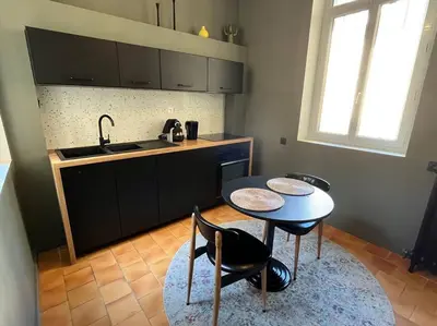 Cuisine ou kitchenette dans l'établissement Appartement au coeur de Caen