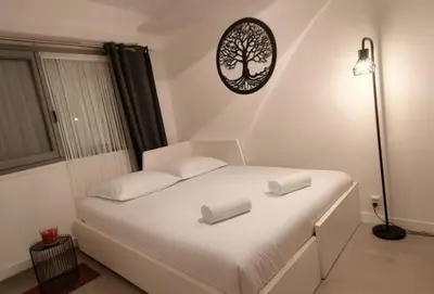Un ou plusieurs lits dans un hébergement de l'établissement Studio Cosy & Parking privé proche Centre CAEN
