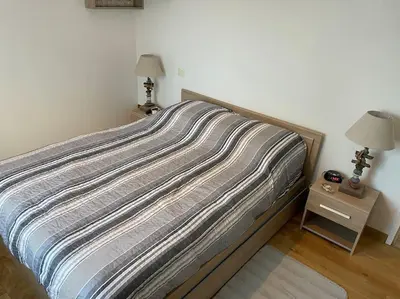 Un ou plusieurs lits dans un hébergement de l'établissement Appartement le Kingsbridge