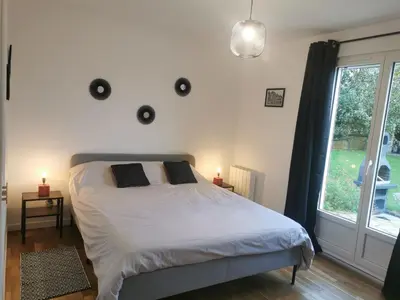 Un ou plusieurs lits dans un hébergement de l'établissement Maison Ô calme