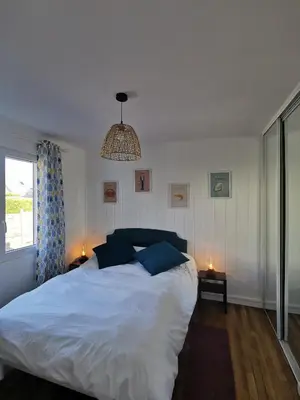 Un ou plusieurs lits dans un hébergement de l'établissement Maison Ô calme