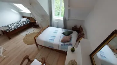 Un ou plusieurs lits dans un hébergement de l'établissement Maison La Rivière