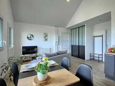 Télévision ou salle de divertissement dans l'établissement Holiday Home Les yeux dans la baie by Interhome
