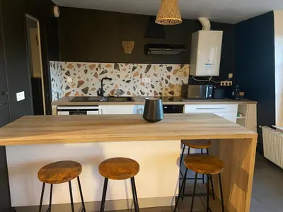 Cuisine ou kitchenette dans l'établissement Appartement centre ville Caen Vaugueux