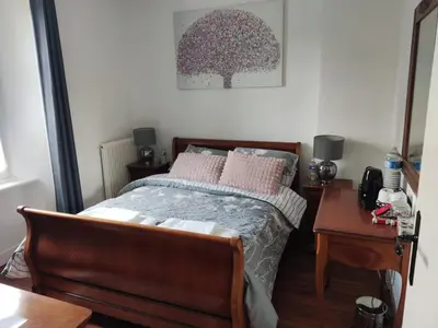 Un ou plusieurs lits dans un hébergement de l'établissement Marianne Cottage Chambre d'Hotes