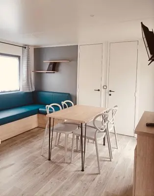 Coin salon dans l'établissement Camping La Sinope