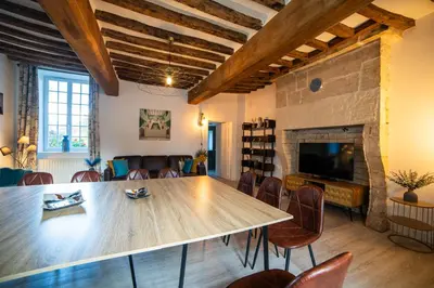 Télévision ou salle de divertissement dans l'établissement Ferme de la Tour