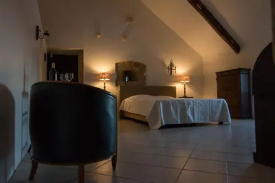 Un ou plusieurs lits dans un hébergement de l'établissement Le Chateau de Claids