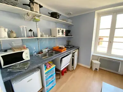 Cuisine ou kitchenette dans l'établissement LES Herbus angle rue de l'avant-garde et 31 rue Jérémie