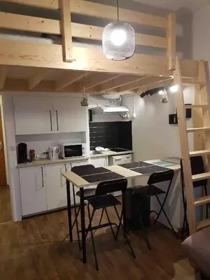 Cuisine ou kitchenette dans l'établissement Studio à la plage