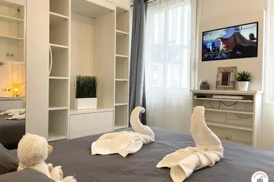 Un ou plusieurs lits dans un hébergement de l'établissement Le Palais des Glaces - Port de Plaisance
