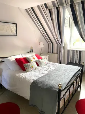 Un ou plusieurs lits dans un hébergement de l'établissement Le Taut 44 - chambre Utah - salle de bains partagée