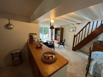 Coin salon dans l'établissement Maison à 100 m de la plage et proche du centre