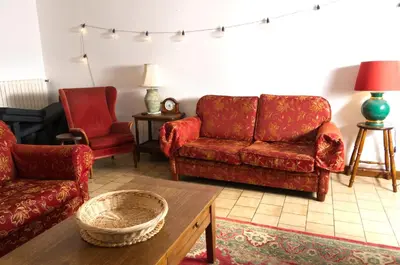 Coin salon dans l'établissement Le Gîte des Violettes