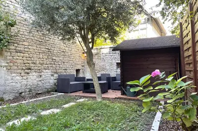 Jardin de l'établissement Le Jardin - Place St Sauveur - Centre Historique