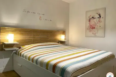 Un ou plusieurs lits dans un hébergement de l'établissement La Loggia - Vue Centre Ville Proche Château