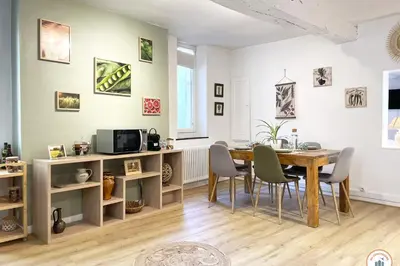Télévision ou salle de divertissement dans l'établissement Le Triplex St-Laurent - Quartier Historique de Caen