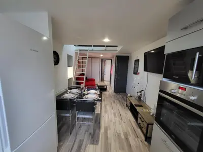Cuisine ou kitchenette dans l'établissement Margotte