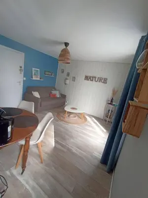 Coin salon dans l'établissement Studio Cabourg - Home-Varaville avec jardin