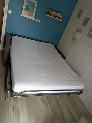 Un ou plusieurs lits dans un hébergement de l'établissement Studio Cabourg - Home-Varaville avec jardin