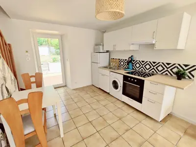 Cuisine ou kitchenette dans l'établissement Maison 30m2 - 1 chambre - Jardin