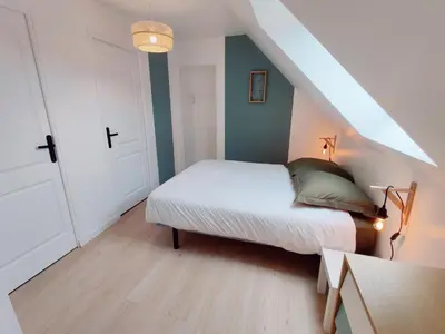 Un ou plusieurs lits dans un hébergement de l'établissement Maison 30m2 - 1 chambre - Jardin