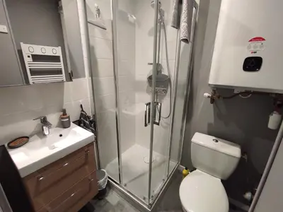 Salle de bains dans l'établissement Au P'tit Littoral