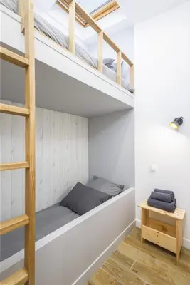Un ou plusieurs lits dans un hébergement de l'établissement Joyful tiny house seaside