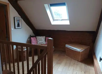 Un ou plusieurs lits dans un hébergement de l'établissement Le Moulin des Hiboux - Gite avec salle de jeux games room