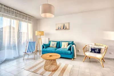 Coin salon dans l'établissement Le Nid Familial de Merville Maison neuve proche Plage 6 pers