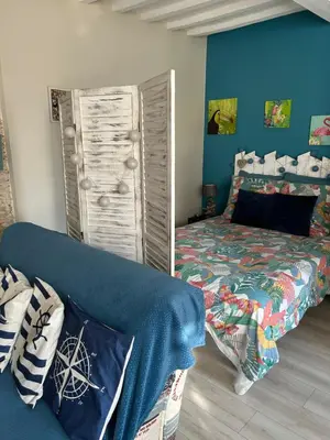 Un ou plusieurs lits dans un hébergement de l'établissement Studio cosy de Luc