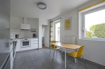Cuisine ou kitchenette dans l'établissement La Potinière - Maison familiale