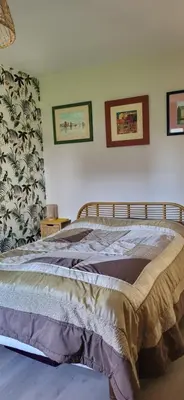 Un ou plusieurs lits dans un hébergement de l'établissement 1 chambre 2 personnes dans une maison avec jardin proche centres d'intérêt et commerces
